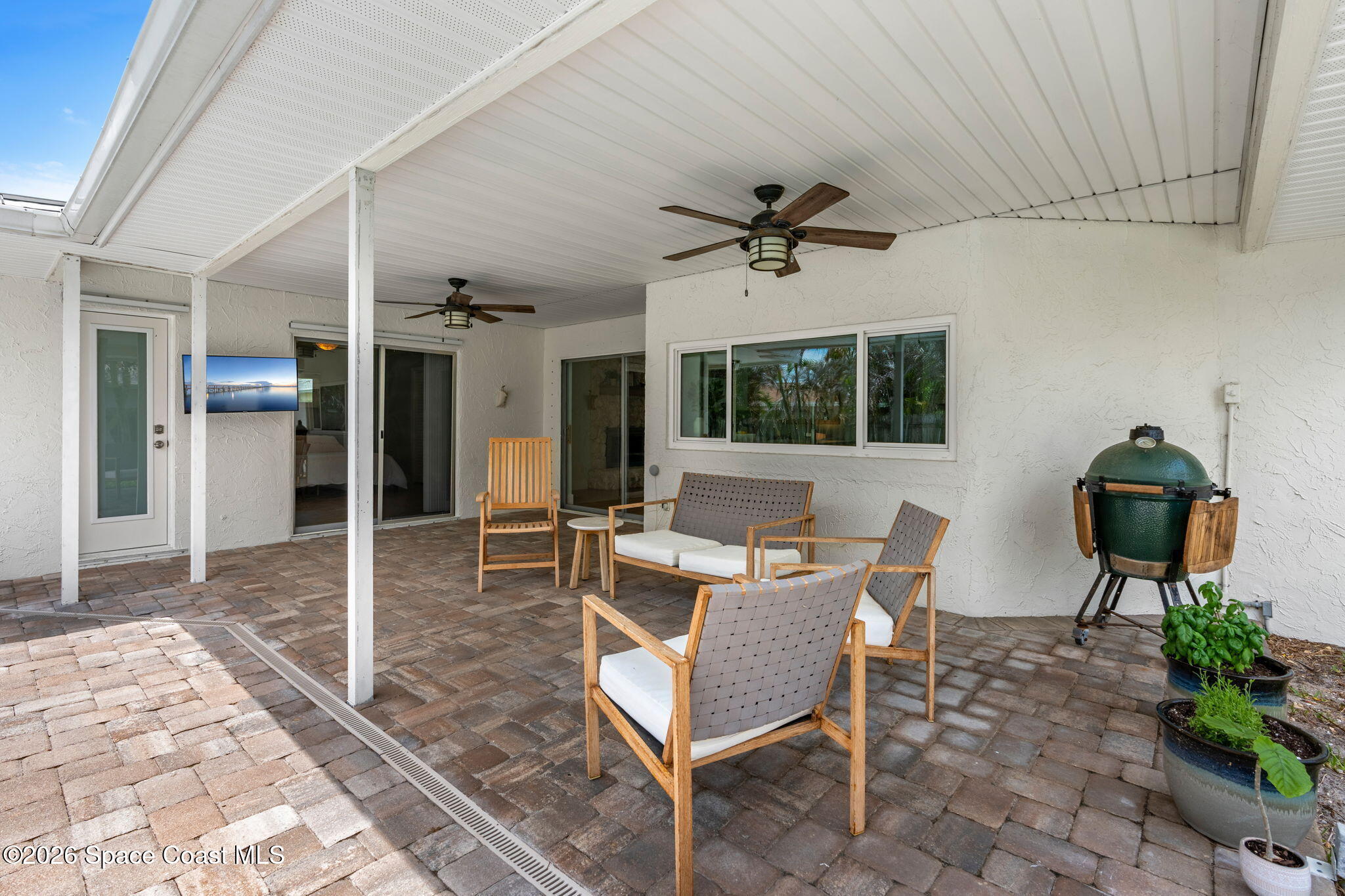 429 Rio Lane Indialantic, FL 32903 - Photo 33 of 50 a view of a livingroom with furniture and a potted plant