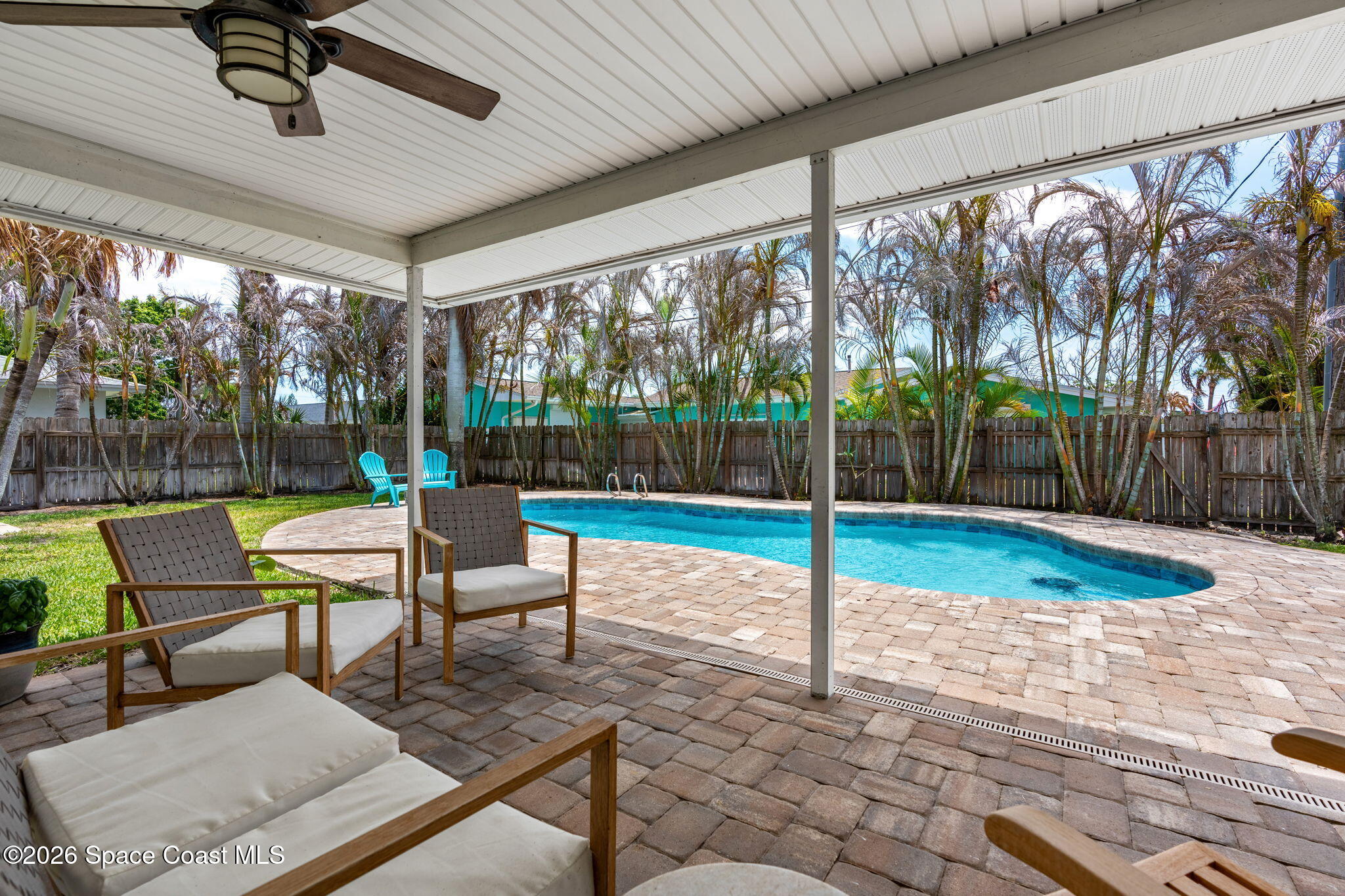 429 Rio Lane Indialantic, FL 32903 - Photo 40 of 50 a building view with a sitting space and garden
