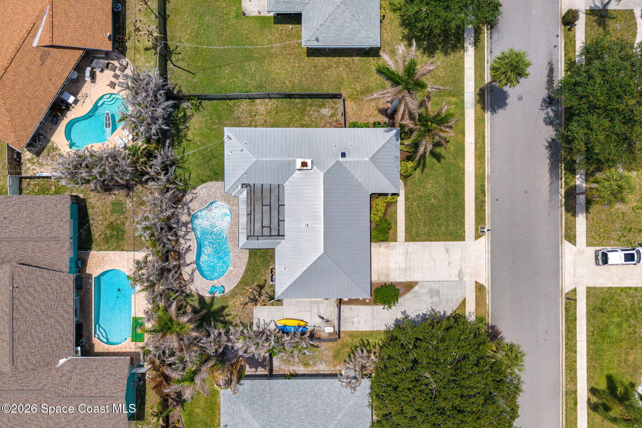 429 Rio Lane Indialantic, FL 32903 - Photo 4 of 50 aerial view of a house with a yard and potted plants