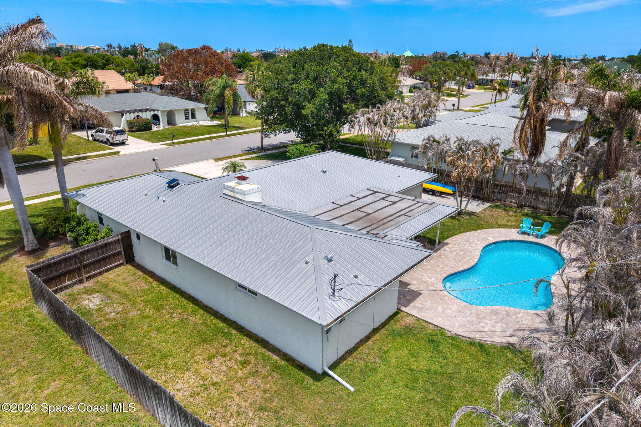 429 Rio Lane Indialantic, FL 32903 - Photo 43 of 50 an aerial view of a house with a swimming pool