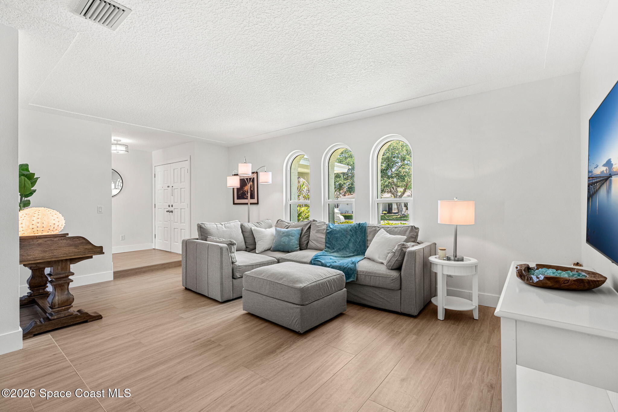 429 Rio Lane Indialantic, FL 32903 - Photo 6 of 50 a living room with furniture and a window