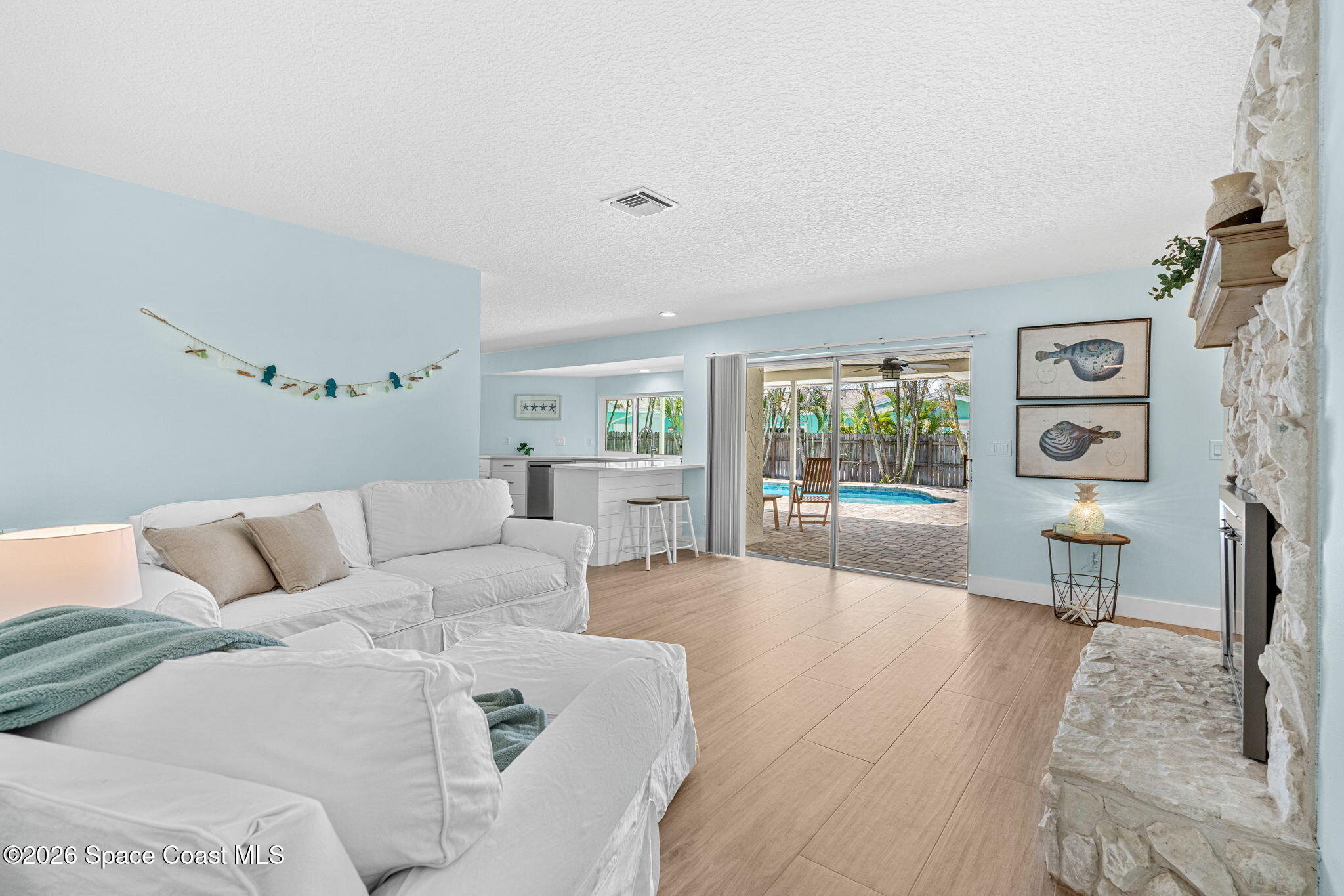 429 Rio Lane Indialantic, FL 32903 - Photo 10 of 50 a living room with furniture and wooden floor