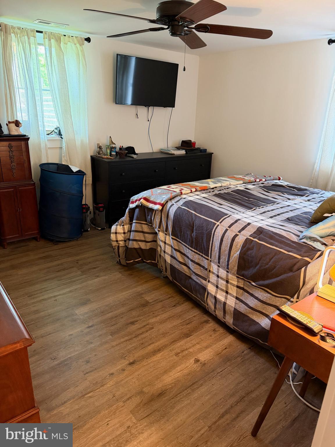 943 Sackettsford Road Warminster, PA 18974 - Photo 15 of 28 a bedroom with a bed and wooden floor