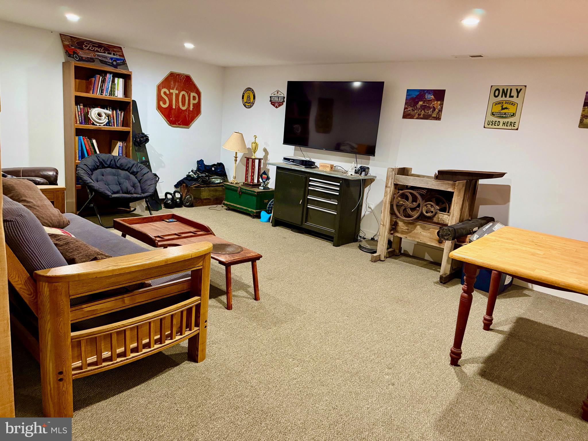 943 Sackettsford Road Warminster, PA 18974 - Photo 19 of 28 a room with furniture and a flat screen tv