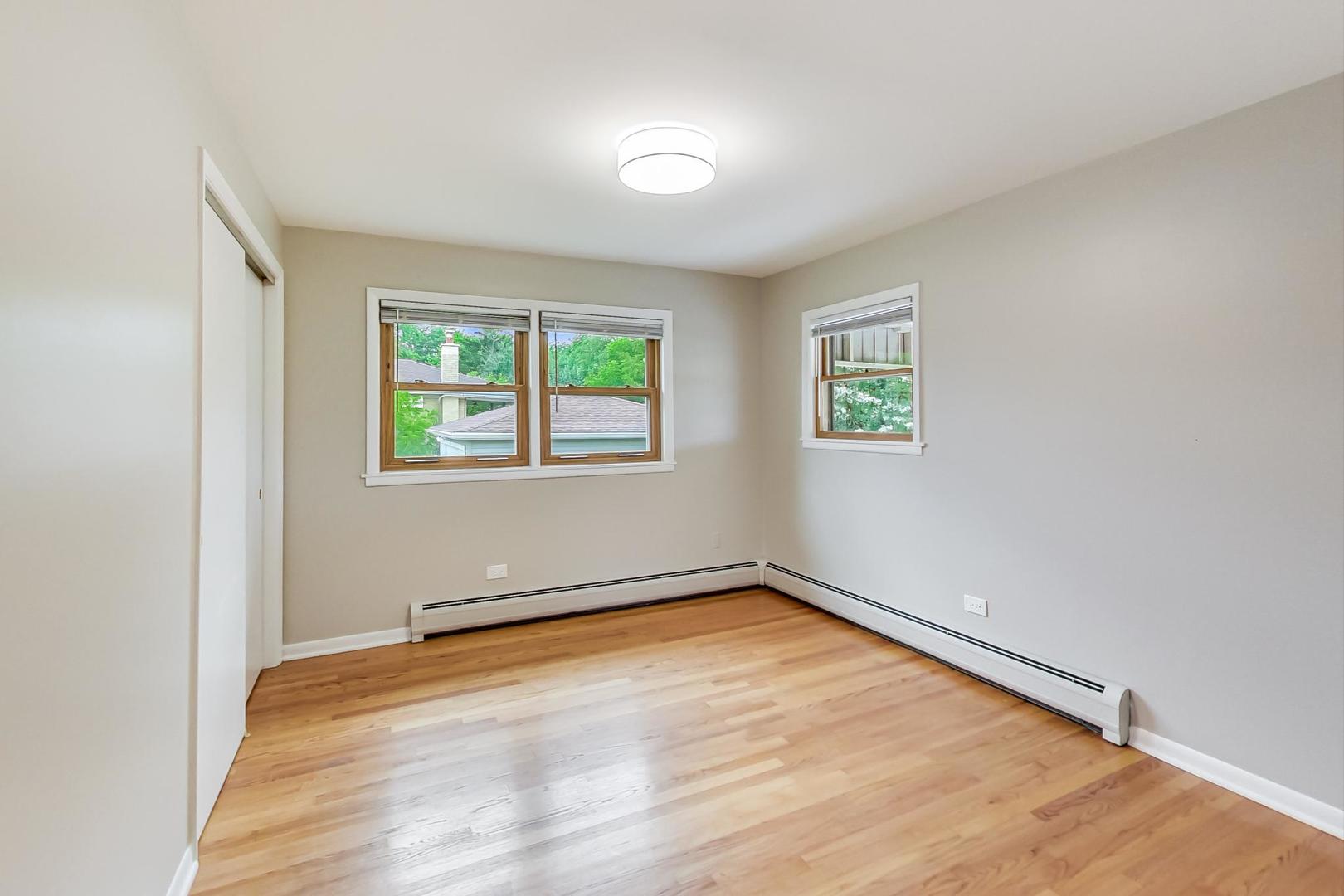 16W674 56th Place Clarendon Hills, IL 60514 - Photo 14 of 41 an empty room with a window