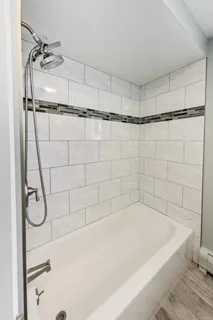 a bathroom with a bathtub