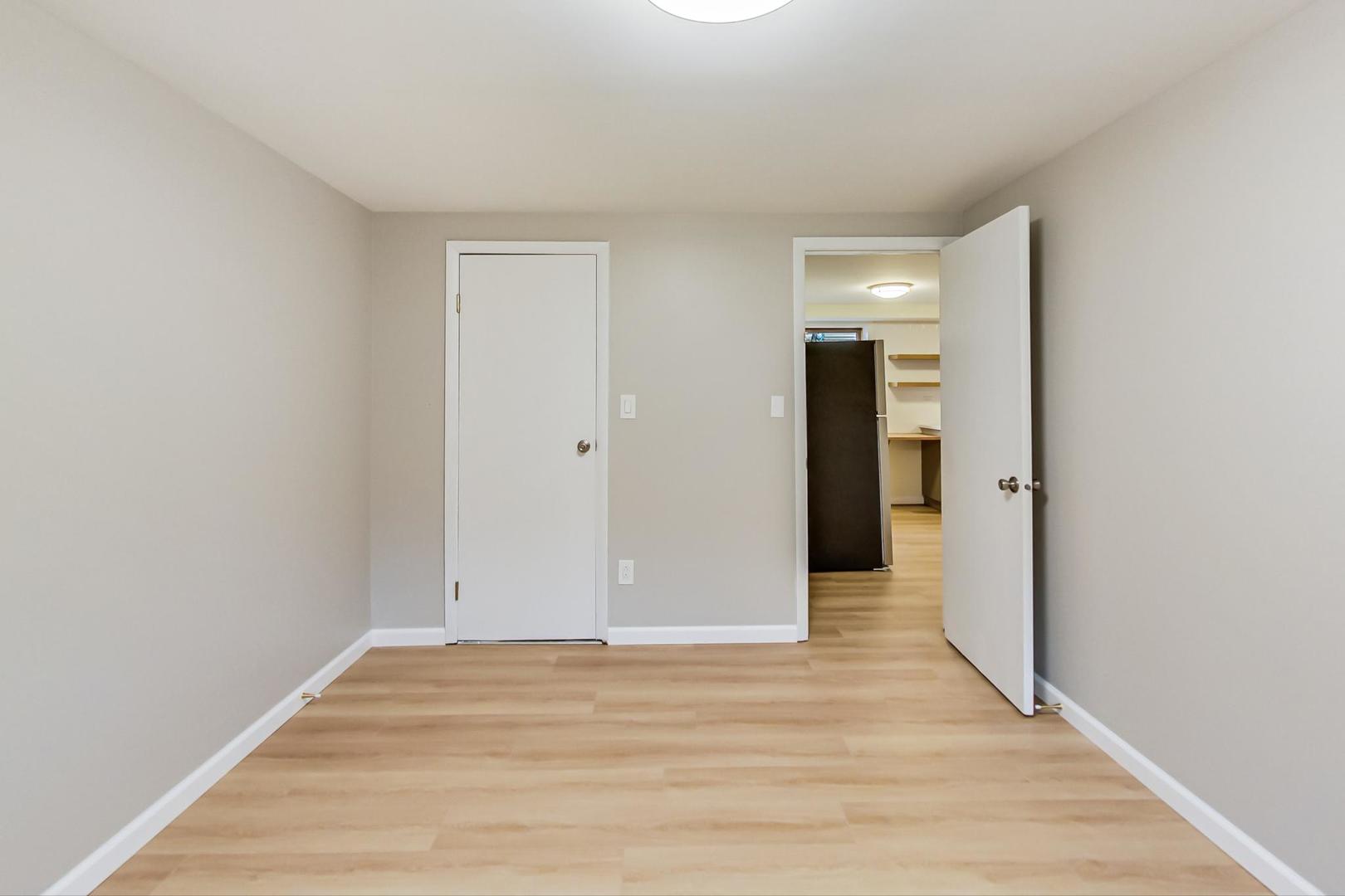 16W674 56th Place Clarendon Hills, IL 60514 - Photo 33 of 41 a view of a room with wooden floor