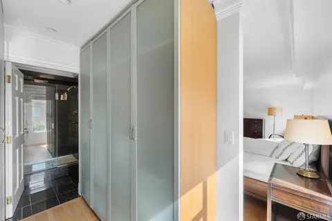 a en suite bathroom with a sink and a mirror