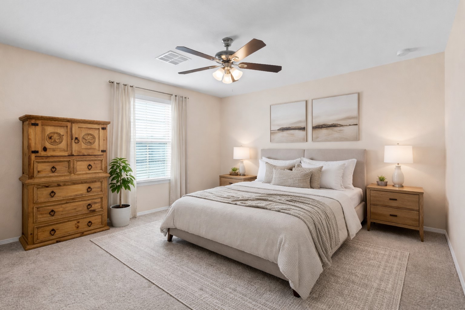 14499 Sunny Bend Way Conroe, TX 77303 - Photo 24 of 41 a bedroom with a bed and a ceiling fan