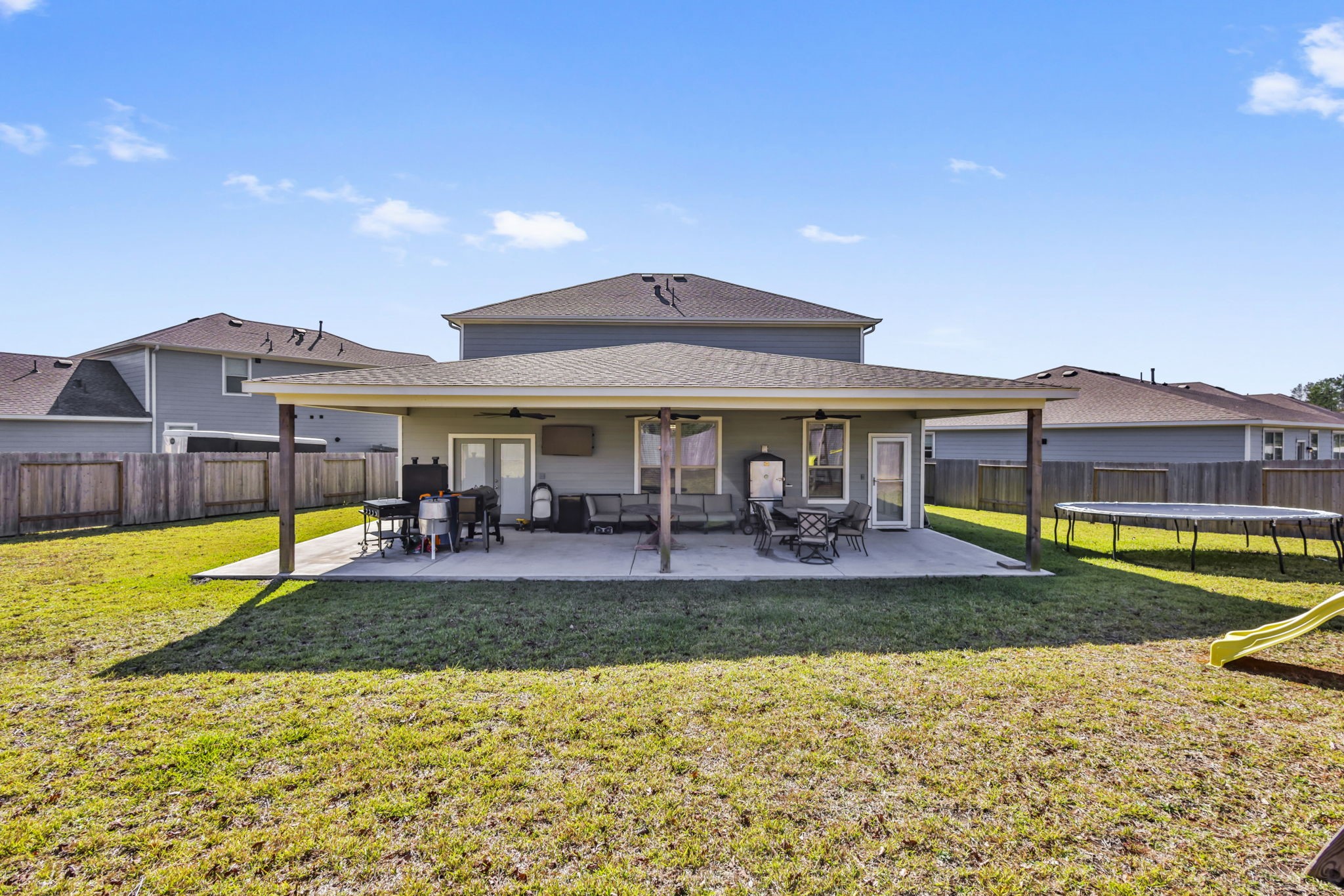 14499 Sunny Bend Way Conroe, TX 77303 - Photo 37 of 41 a view of a house with swimming pool and a yard