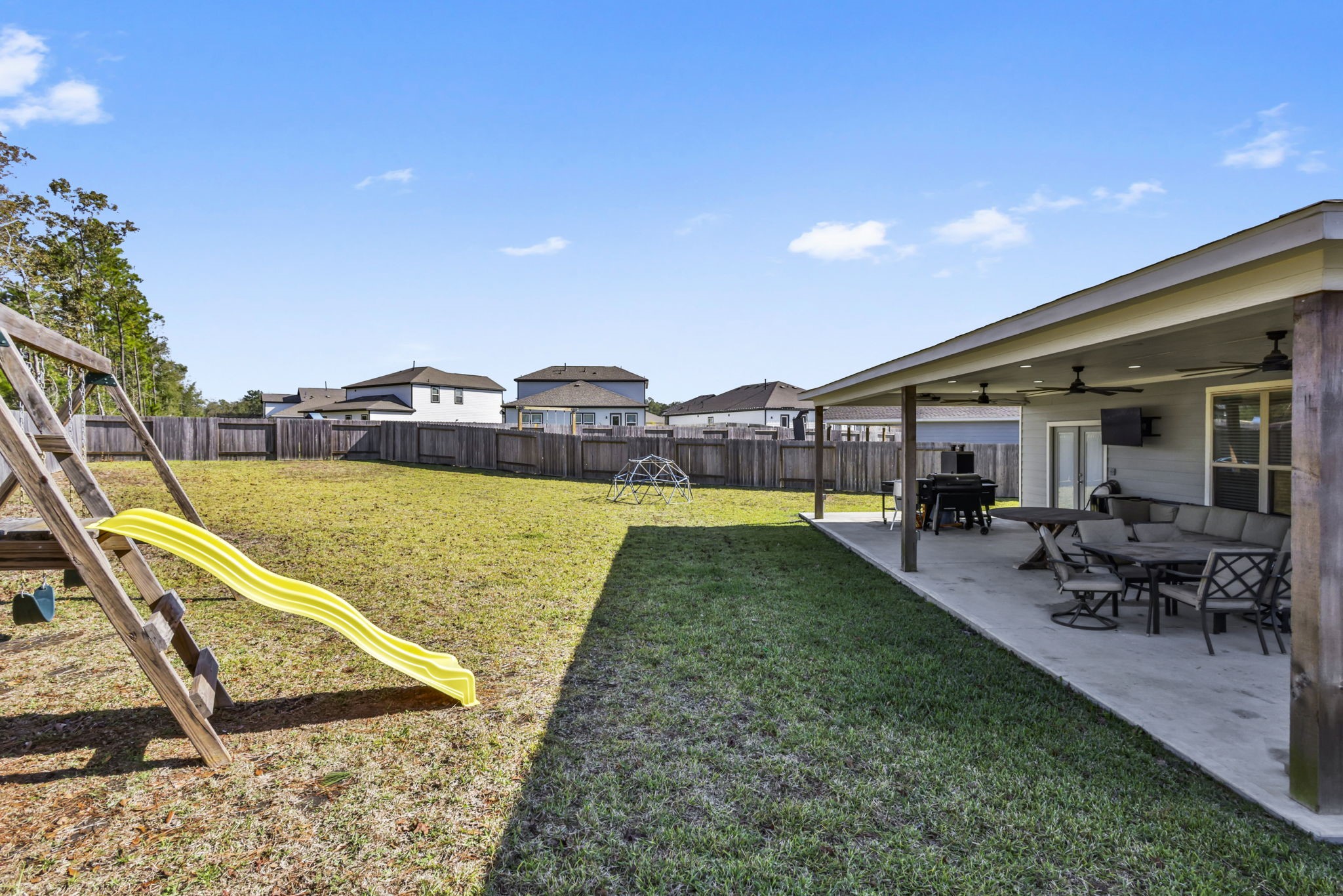 14499 Sunny Bend Way Conroe, TX 77303 - Photo 38 of 41 a view of swimming pool with lawn chairs and plants