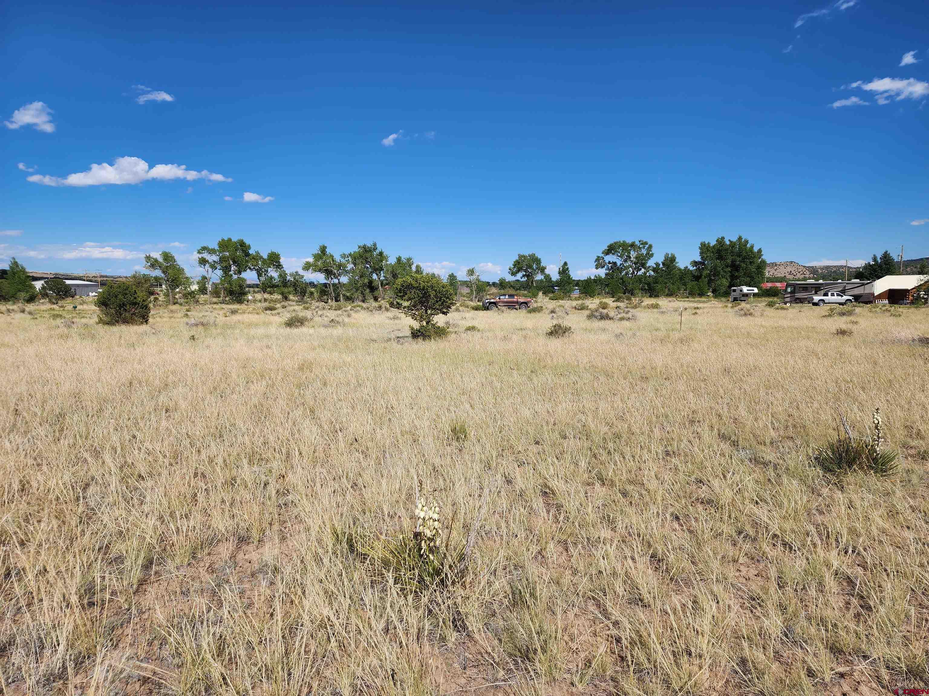 1275 Mohee Road South Fork, CO 81154 - Photo 2 of 5 a view of beach and sunset