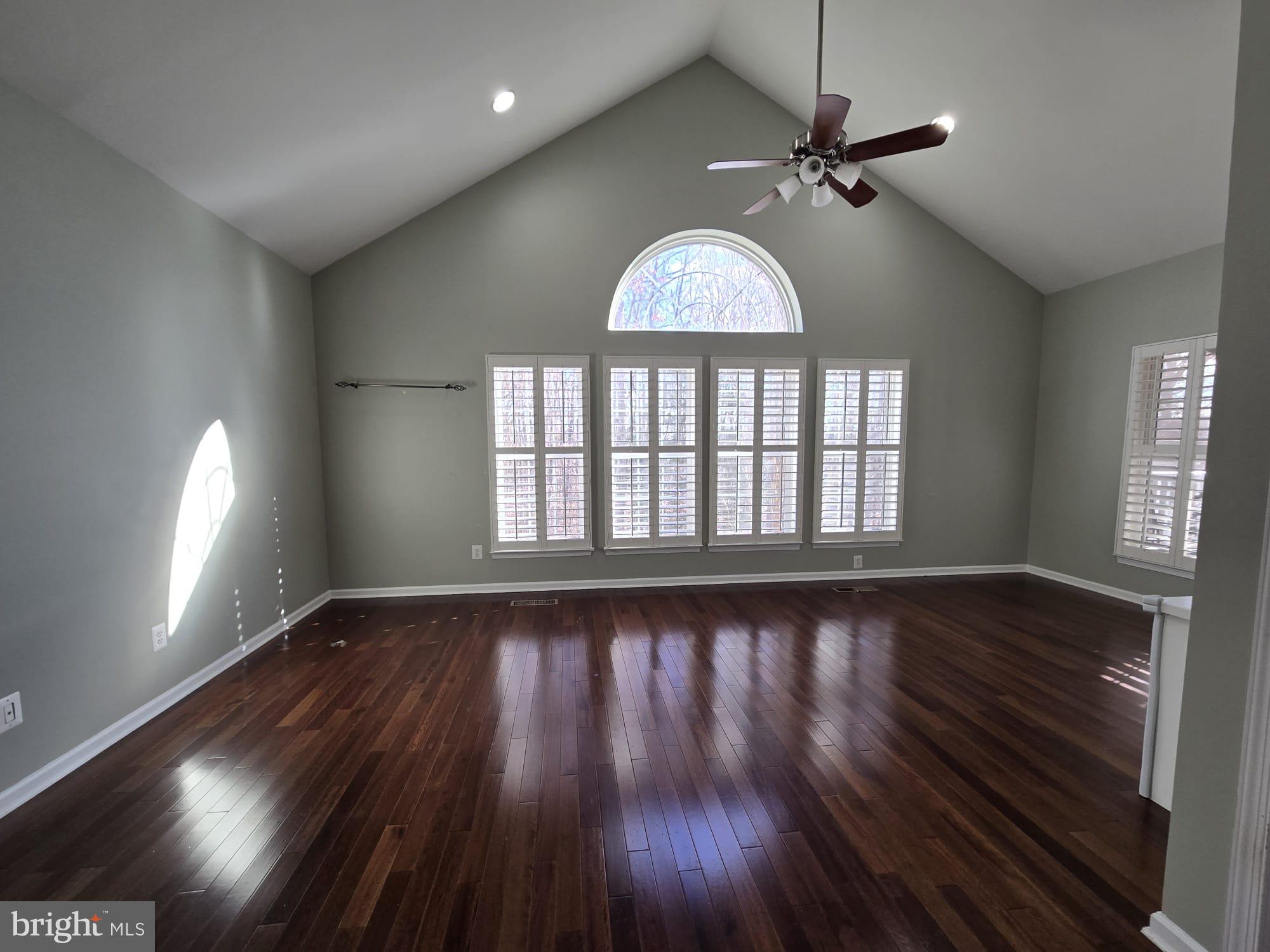 25170 Fortitude Terrace Chantilly, VA 20152 - Photo 13 of 50 wooden floor in an empty room with a window