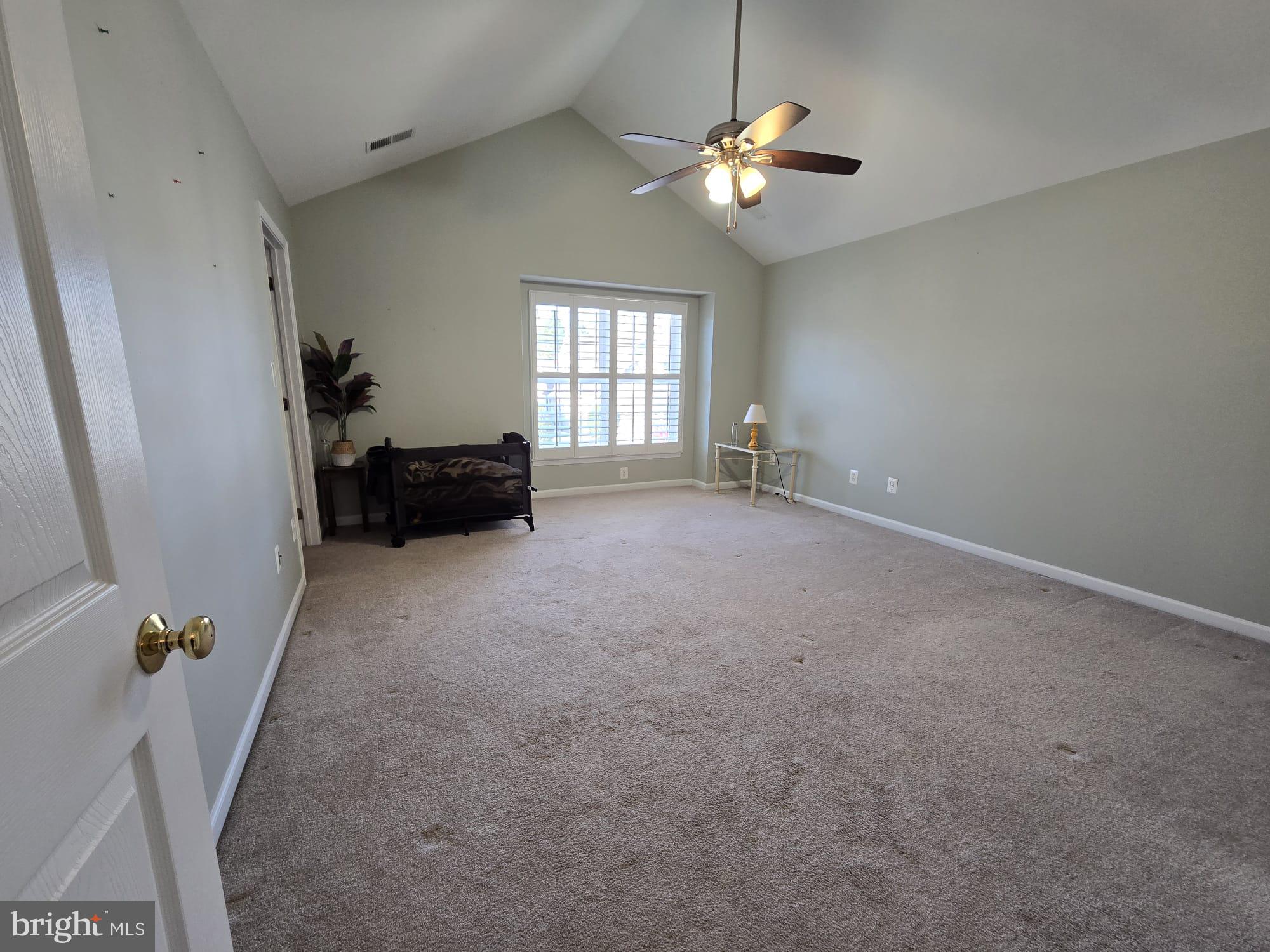 25170 Fortitude Terrace Chantilly, VA 20152 - Photo 28 of 50 an empty room with windows and fan