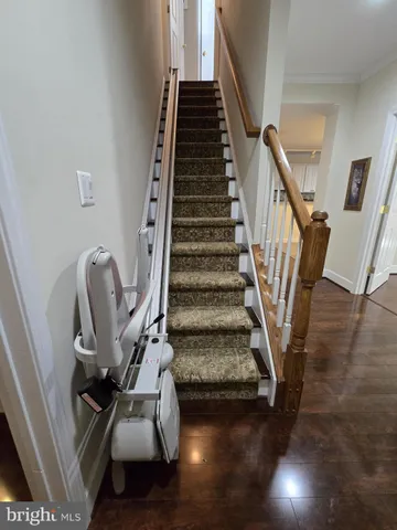 a view of entryway with wooden floor