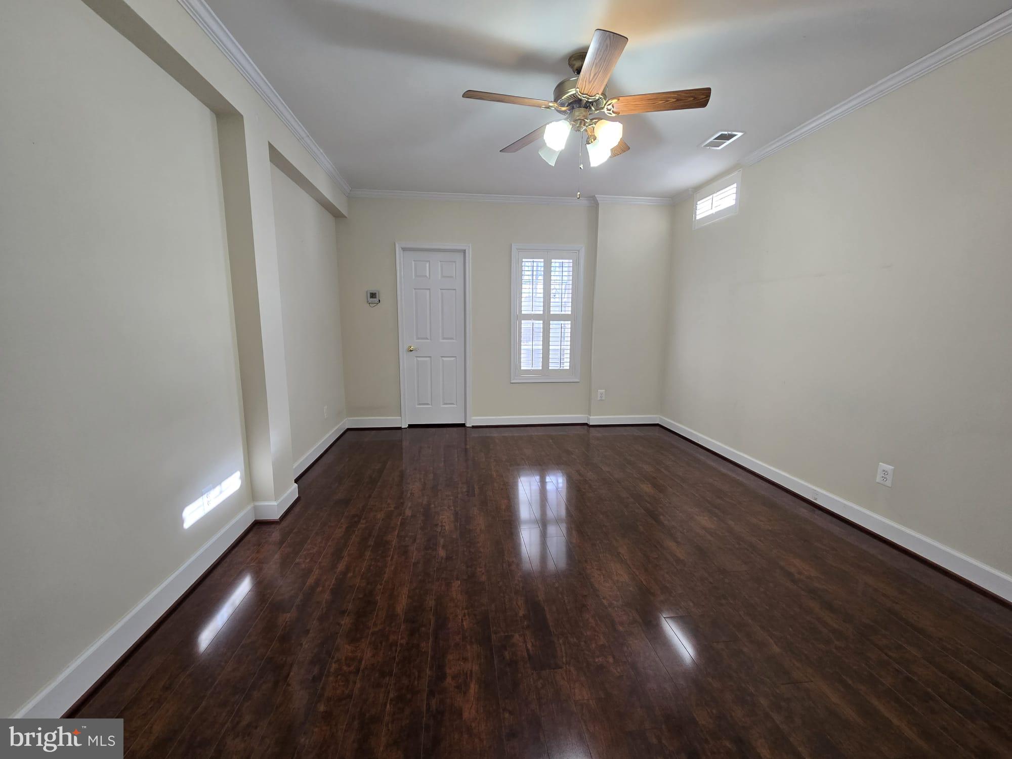 25170 Fortitude Terrace Chantilly, VA 20152 - Photo 39 of 50 wooden floor in an empty room with a window