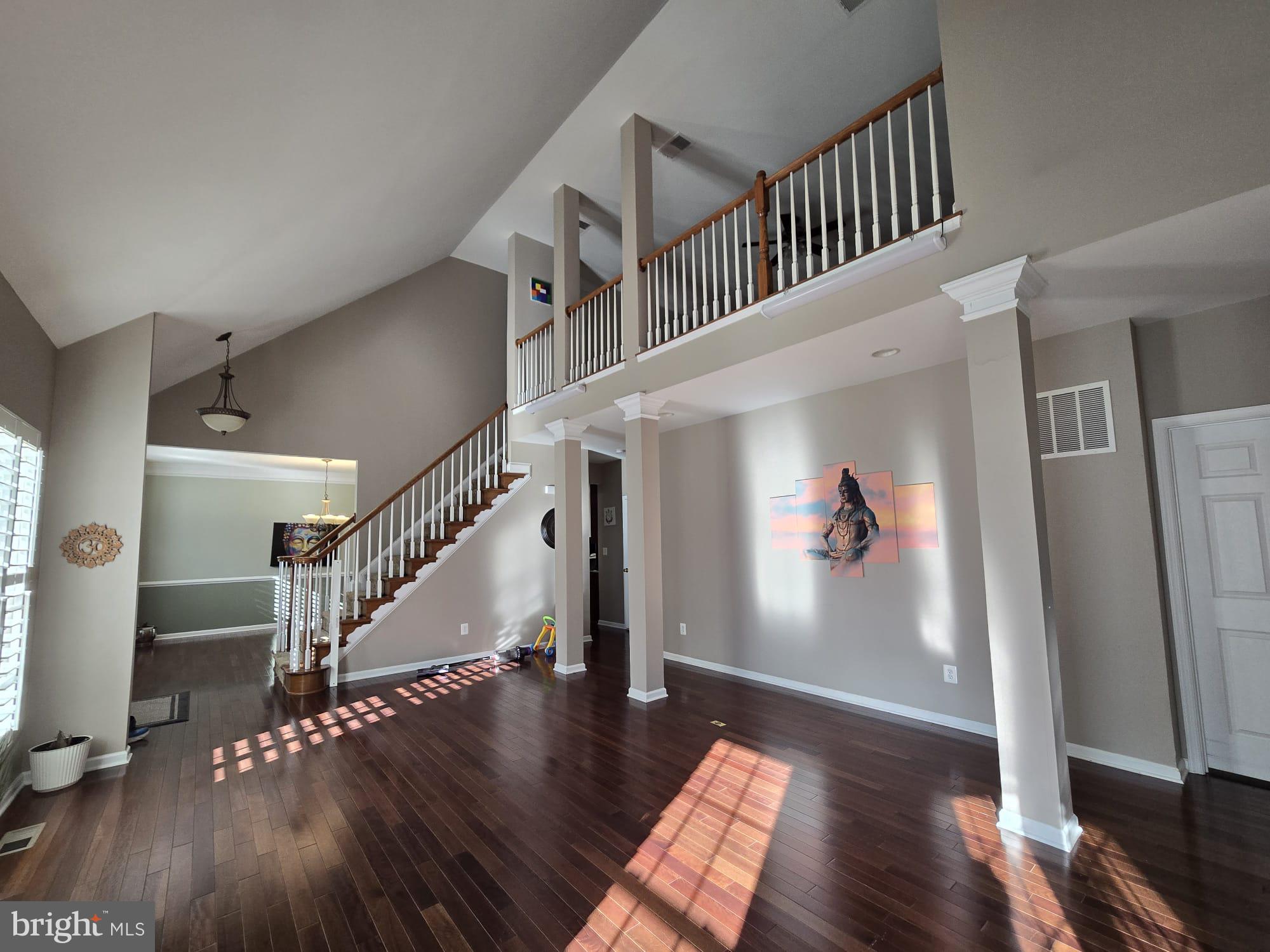 25170 Fortitude Terrace Chantilly, VA 20152 - Photo 6 of 50 a view of entryway with wooden floor
