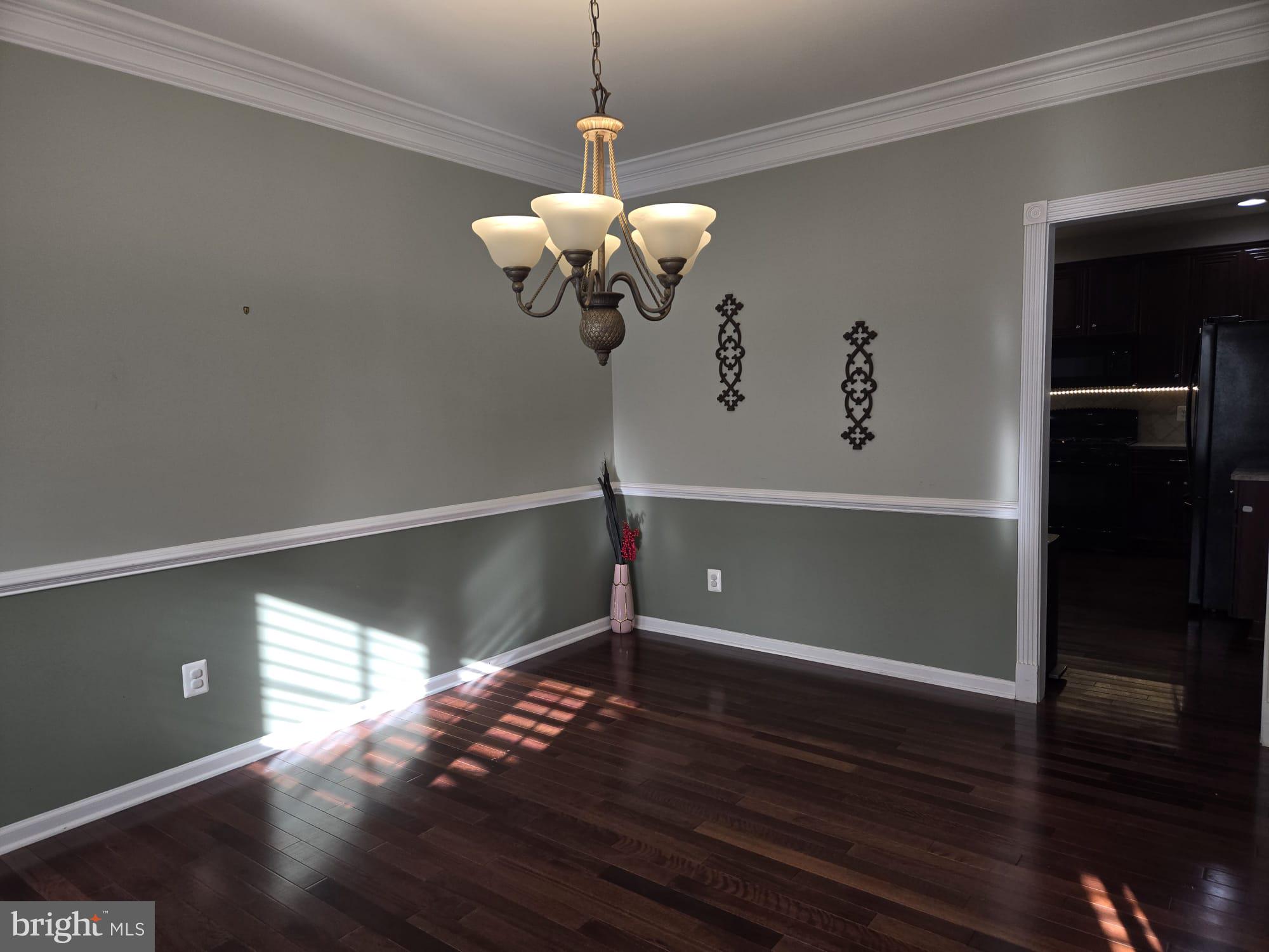 25170 Fortitude Terrace Chantilly, VA 20152 - Photo 9 of 50 a view of a room with wooden floor