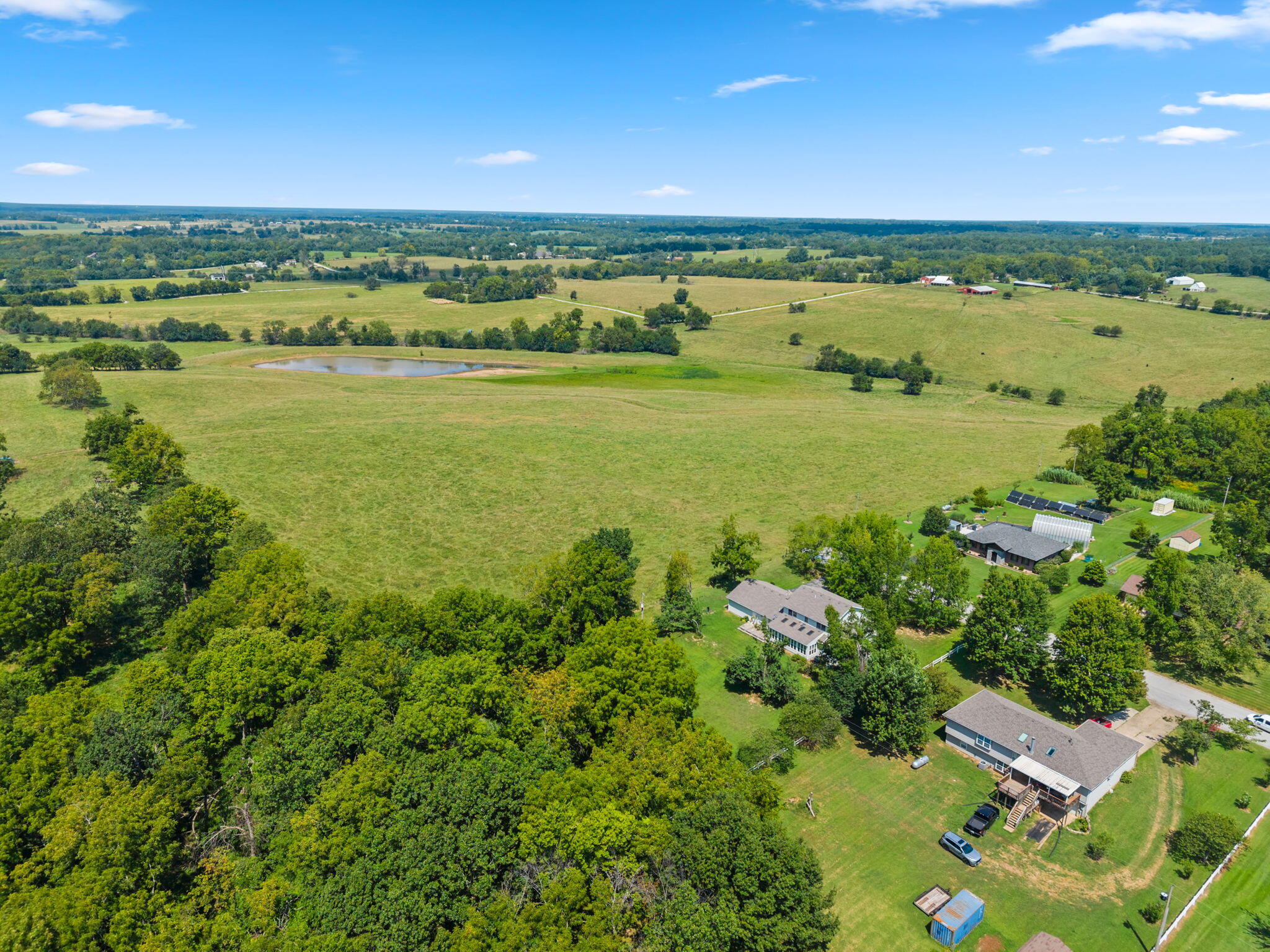 8488 Sunset Drive Springfield, MO 65802 - Photo 3 of 52 61-web-or-mls-DJI_20260803115727_0226_D