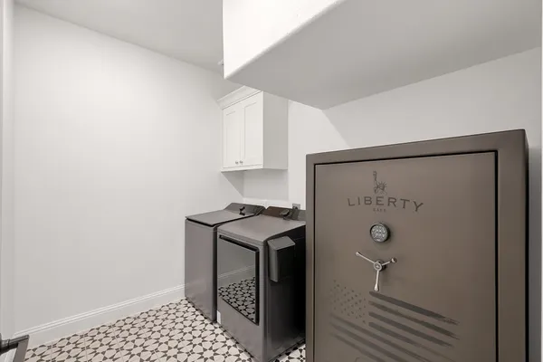 a kitchen with a refrigerator and a stove
