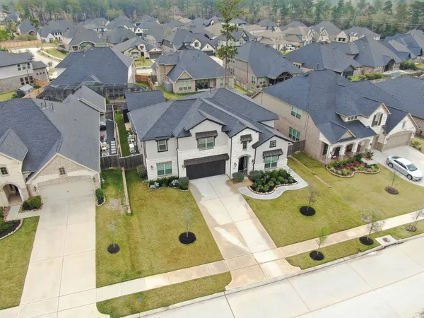 an aerial view of residential house with parking space