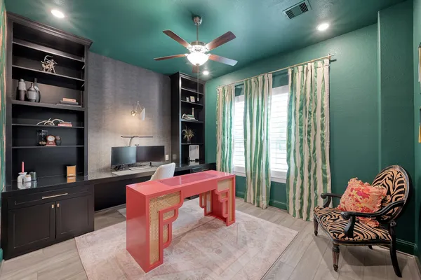 a bedroom with a bed and furniture