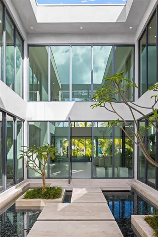 a view of kitchen and dining area with furniture