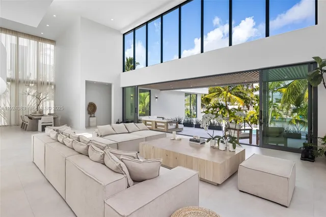 a large white bed in a white room