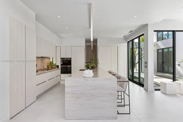 a view of a bedroom from a hallway