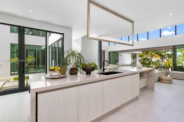 a bathroom with a sink a mirror and a bathtub