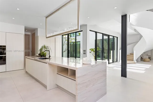 a bedroom with a bed and a table in it