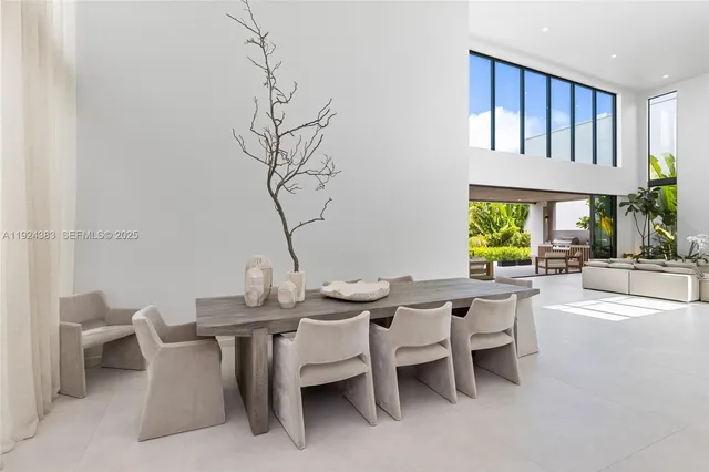 a bedroom with a large bed and a couch