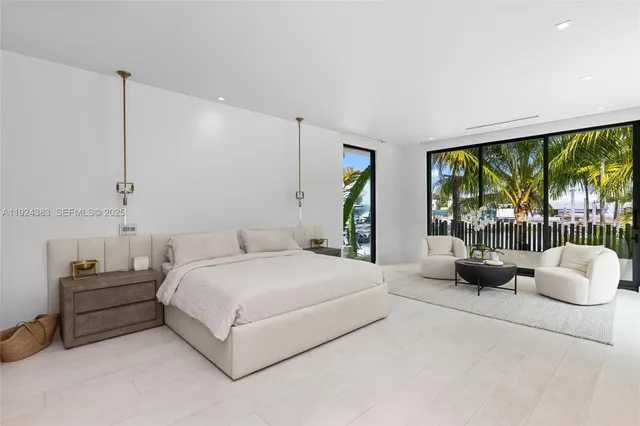 a bathroom with a double vanity sink a toilet a shower and a bathtub