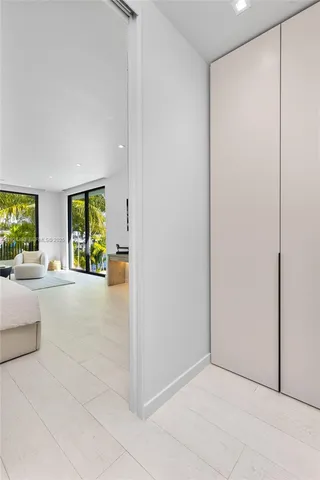 a view of an apartment with a swimming pool