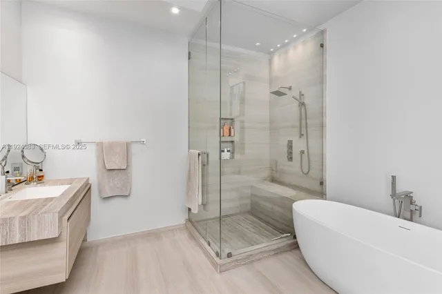 an aerial view of a house with garden space and street view