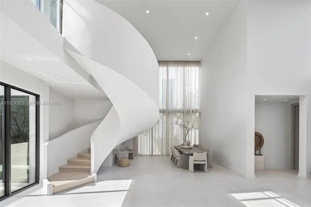 an aerial view of a house with a garden