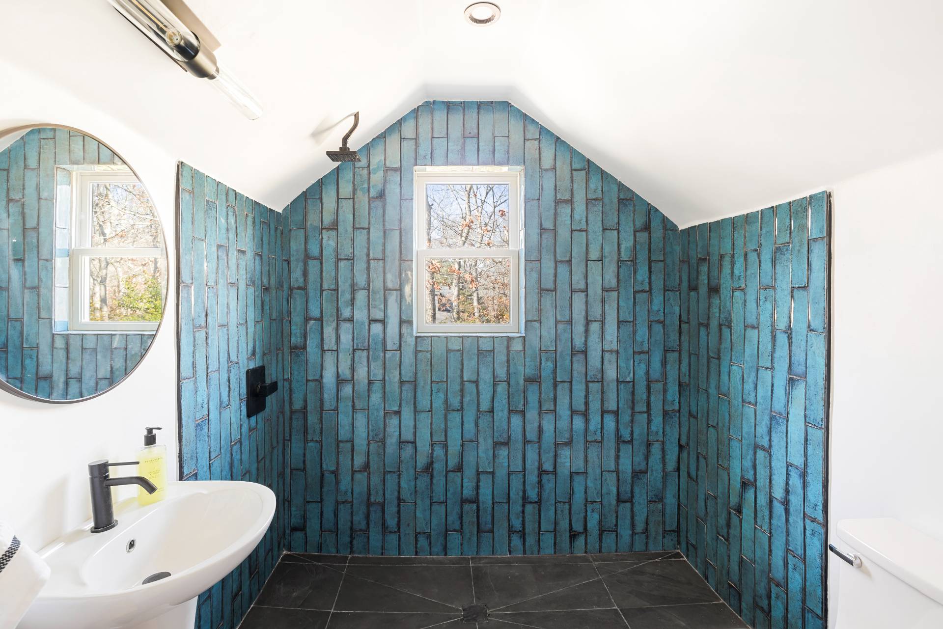 569 Toppings Path Sagaponack, NY 11962 - Photo 24 of 30 a bathroom with a toilet sink a shower and mirror