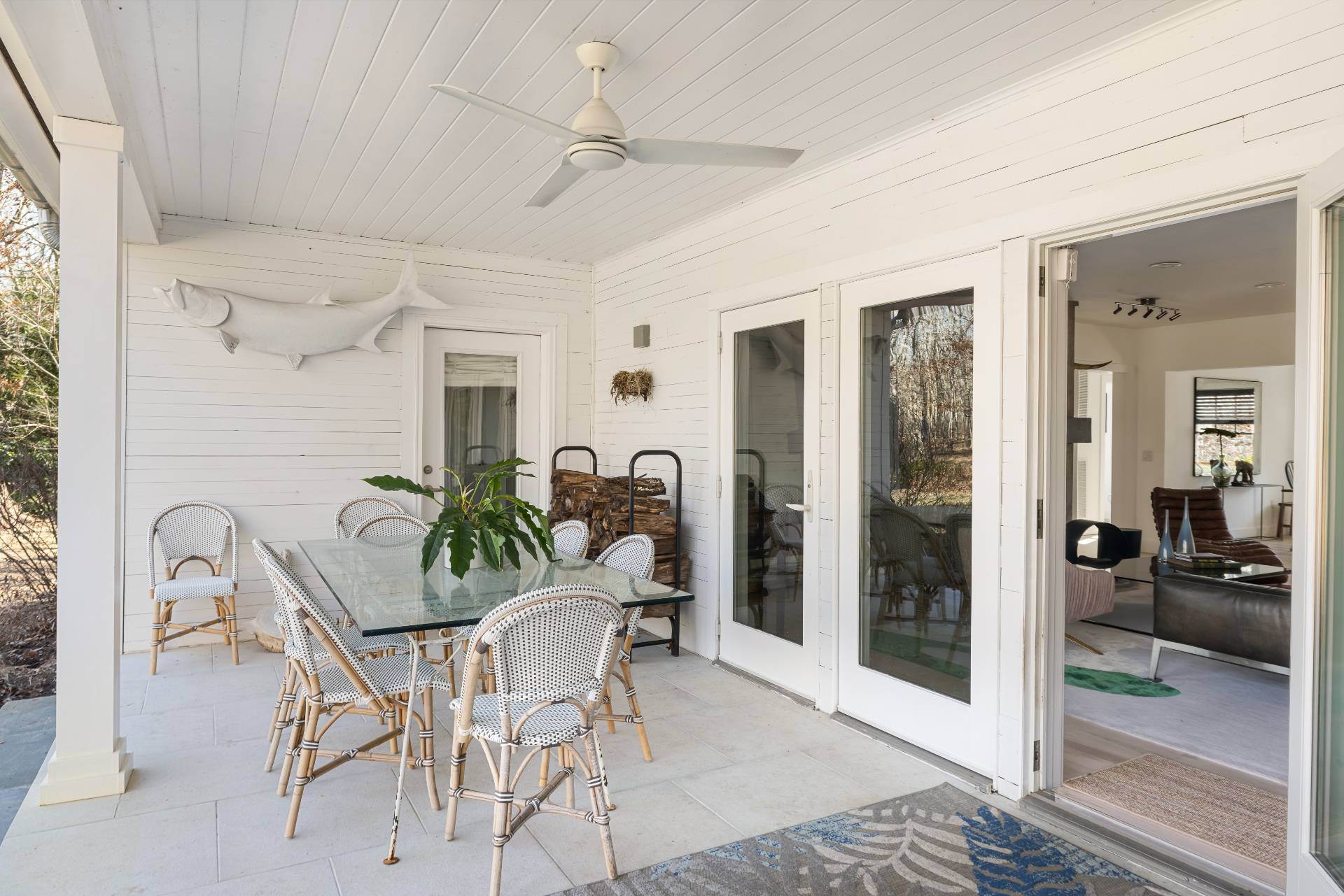 569 Toppings Path Sagaponack, NY 11962 - Photo 27 of 30 a dining room with furniture and a floor to ceiling window