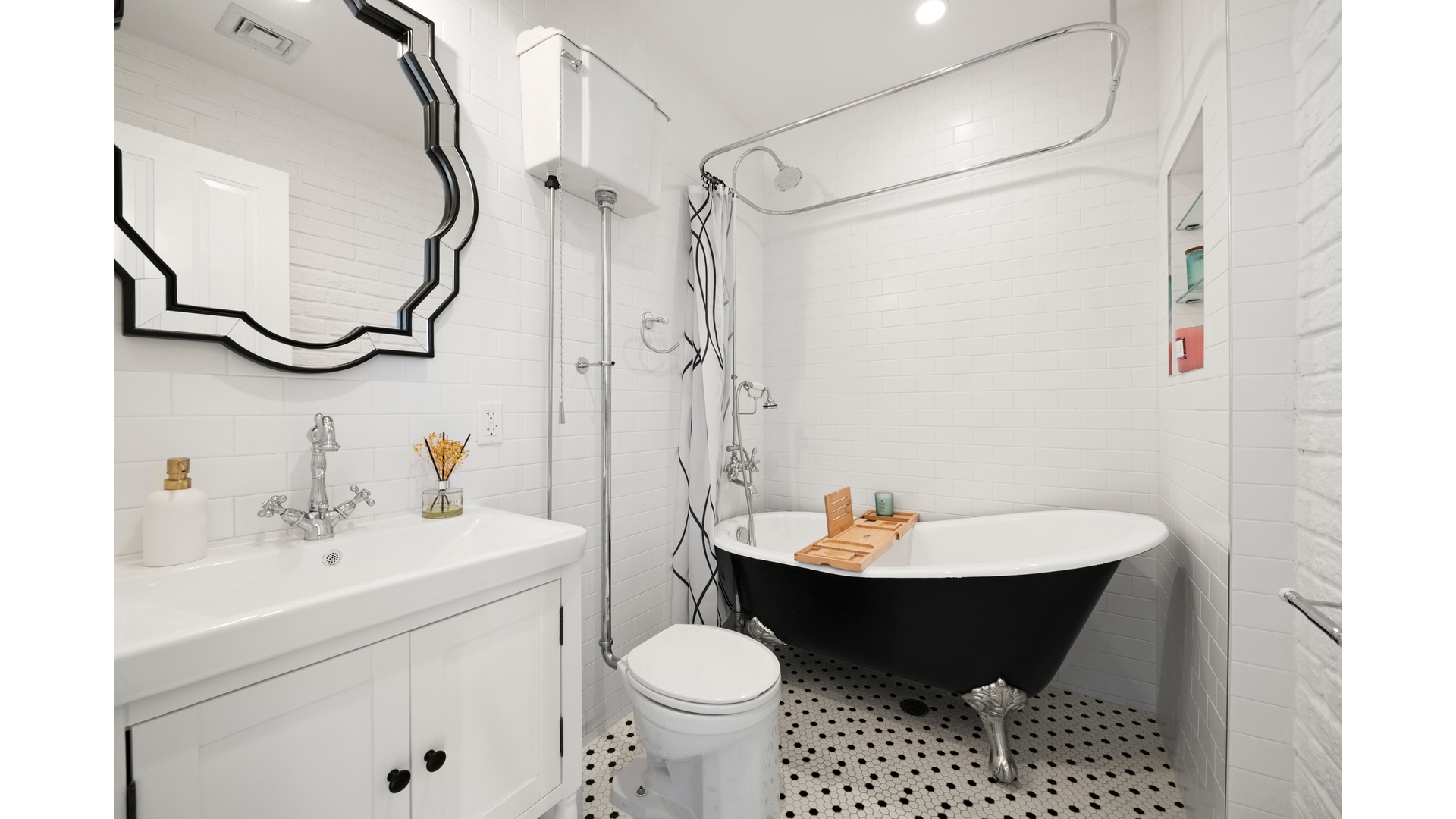 577 Madison Street, Unit 2A Brooklyn, NY 11221 - Photo 11 of 14 a bathroom with a sink toilet and a mirror