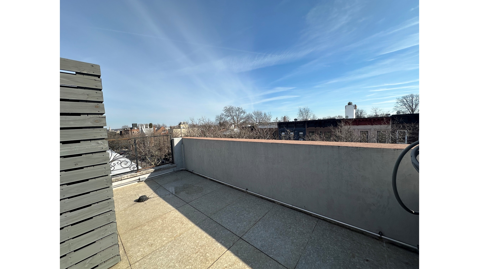 577 Madison Street, Unit 2A Brooklyn, NY 11221 - Photo 12 of 14 a view of balcony with wooden floor