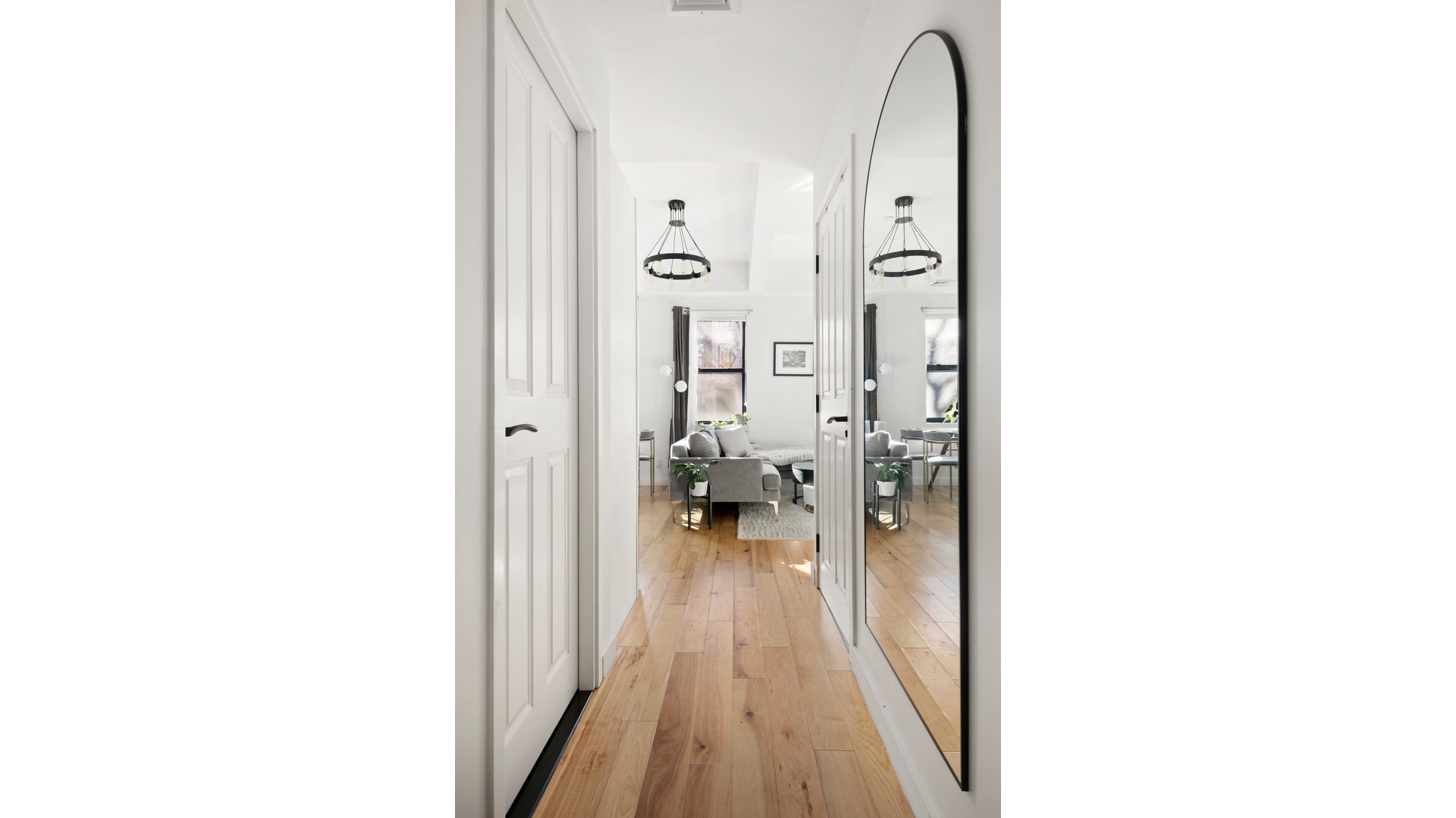 577 Madison Street, Unit 2A Brooklyn, NY 11221 - Photo 13 of 14 a picture of a bathroom with a sink and a mirror