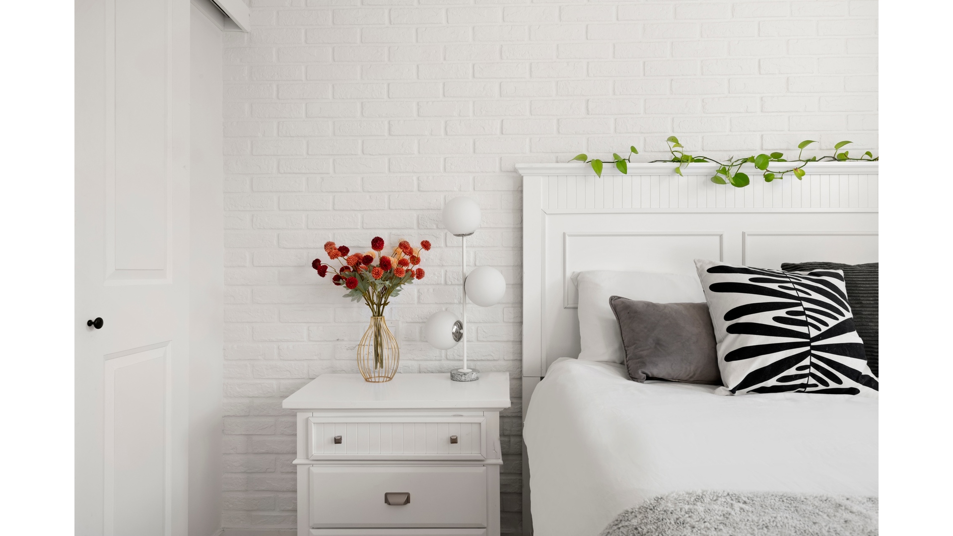 577 Madison Street, Unit 2A Brooklyn, NY 11221 - Photo 7 of 14 a bedroom with a bed and a dresser