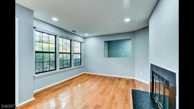 a view of a hallway view with staircase