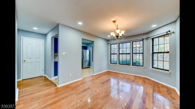 a kitchen with stainless steel appliances granite countertop a refrigerator stove a sink and dishwasher