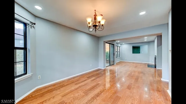 a view of stairs and wooden floor