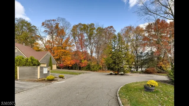 a view of house with yard and entertaining space