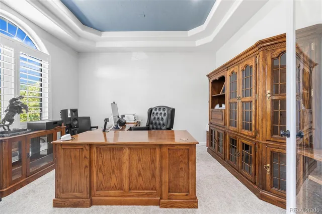 a kitchen with stainless steel appliances a sink and a refrigerator