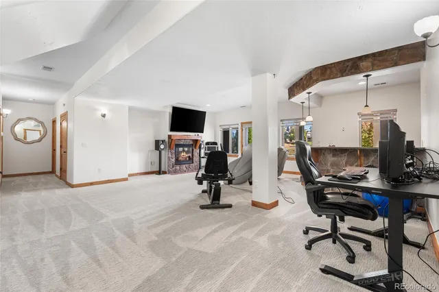 a view of a workspace with gym equipment