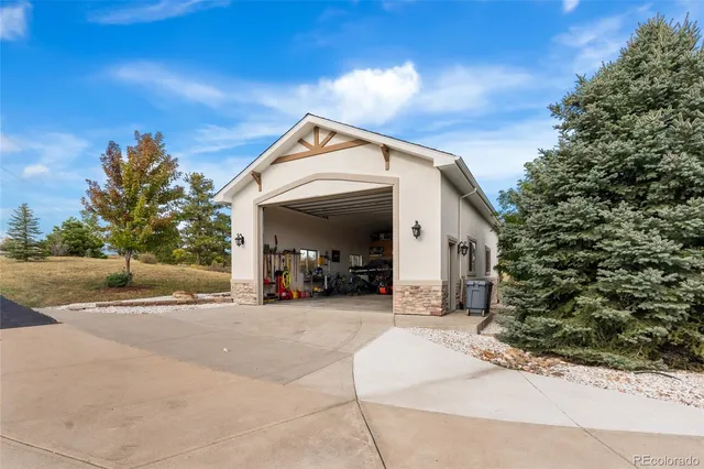 a view of a house with outdoor space and shower view