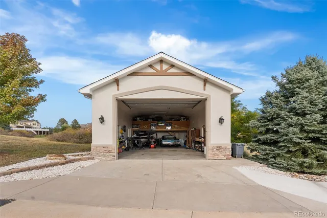 a view of a car park in front of house